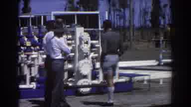 Brisbane Australia (1967): Three Workers Observing Managing Industrial Worksite