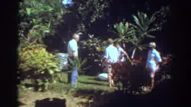 Fort Lauderdale Florida (1967): Woman Wearing Black Shorts Walks Past White Object