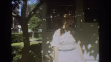 Fort Lauderdale Florida (1967): Woman Glasses Speaking Walking Outside House