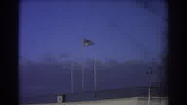 Perth Australia (1967): Flag Flaps In Wind While Man Boards Plane