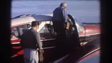 Perth Australia (1967): Old Rich Man Entering His Private Helicopter With His Son