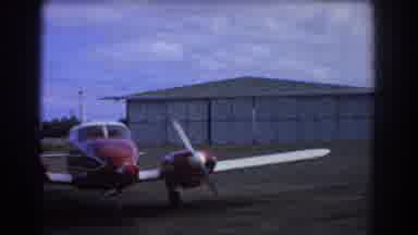 Perth Australia (1967): An Empty Plane Park Area With An Old School Training Plane