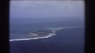 Perth Australia (1967): The Camera Captures The Calm Blue Sea And Waves As We Fly