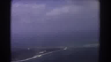 Perth Australia (1967): The Camera Captures The Ocean And The Shore From Above On