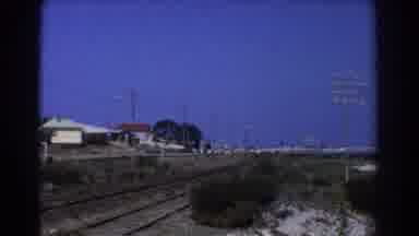 Perth Australia (1967): View Of Railroad Tracks With Telephone Lines And Buildings
