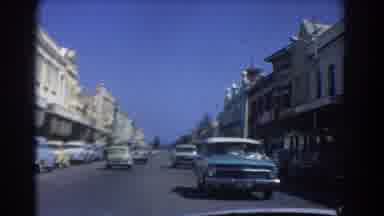 Perth Australia (1967): Cars In Traffic Going Through A Commercial Area
