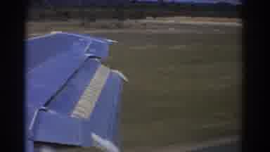 Perth Australia (1967): Plane Wing Extends During Takeoff From Runway Surrounded
