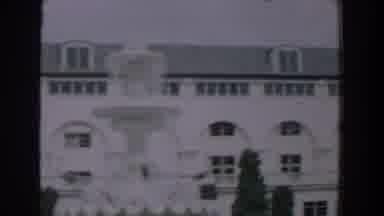 Florida (1957): Huge White Building With A Long Length And Also Windows With Trees