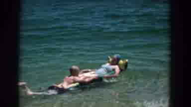 Florida (1957): Family Enjoying A Leisurely Summer Day On A Sunny Beach