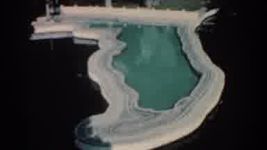 Florida (1957): Shallow Blue Pool Connected To A Dock On The Ocean On A Summer