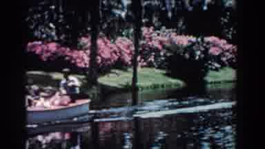Florida (1957): Group Of People Riding In Small Motor Boat In Body Of Water In