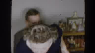 Wheeling Ohio (1957): Woman Getting Something