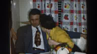 Wheeling Ohio (1957): Woman Wearing A Yellow Blouse Puts Her Arm Around A Man