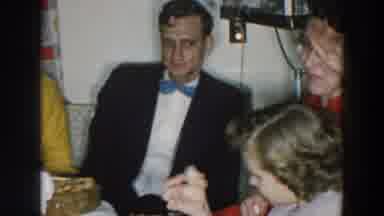 Wheeling Ohio (1957): Well Dressed Family Gathers To Share Meal Around Dinner