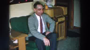 Wheeling Ohio (1957): A Gentleman And Lady Sitting On A Sofa In The Living Room Of
