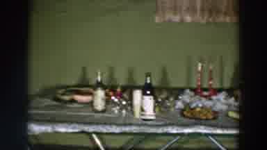 Wheeling Ohio (1957): Green And Silver Table Laden With Snacks Spirits And Red