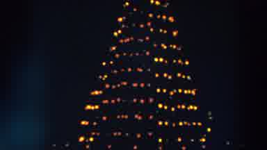 Wheeling Ohio (1957): A Christmas Tree Shaped Machine Flashes Yellow And Orange In