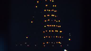 Wheeling Ohio (1957): Rotating Blurry Gold Lights Attached To An Unknown Large