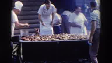 Wheeling Ohio (1957): Men Grilling Meat And Basting It With Barbecue Sauce At