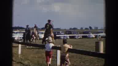 Wheeling Ohio (1957): Peoples And Children Watching The House Riding In A Ground