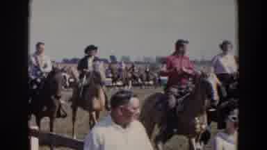 Wheeling Ohio (1957): A Group Of People Riding On Horses Inside Of A Paddock