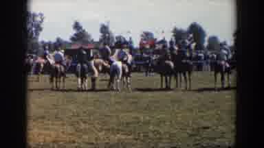 Wheeling Ohio (1957): Seven People Lined Up On Horseback On A Sunny Day