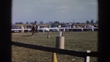 Wheeling Ohio (1957): Person Riding His Horse Down The Course And Throws Something