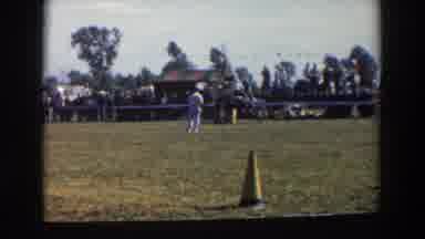 Wheeling Ohio (1957): Person Wearing White Shirt Rides Brown Horse In An