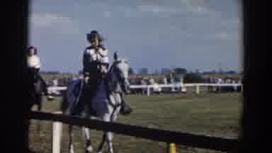 Wheeling Ohio (1957): People On Horseback Ride Around Grassy Show Ring Inside