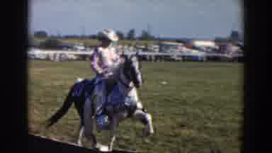 Wheeling Ohio (1957): Lady On Horseback Rides Around Grassy Show Ring On Sunny Day