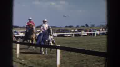 Wheeling Ohio (1957): Woman And Men Are Riding Horses While Wearing White Hats