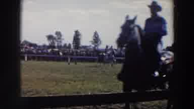 Wheeling Ohio (1957): A Woman That Goes On Horseback In A Enclosure Together Other