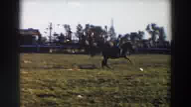 Wheeling Ohio (1957): A Kid Watching Horse Racing Event Taking Place In The Arena