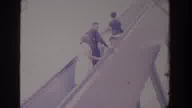 Florida (1958): Three People And Two Children Are Going Up Something And There Is