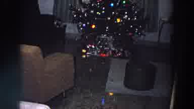 Italy-1958: View Of Fully Trimmed Christmas Tree With Blinking Lights And Gifts