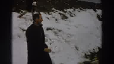 Italy (1958): A Man And His Kid Playing With Ice Balls In A Open Ice ground