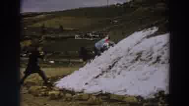 Italy (1958): Father And Children Play With Snow On A Winter Day