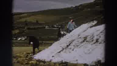 Italy (1958): Three People Building A Hill Of Snow And Throwing Snowballs Among A