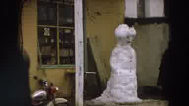 Winter's chill has turned this man's smile into a frozen asset!