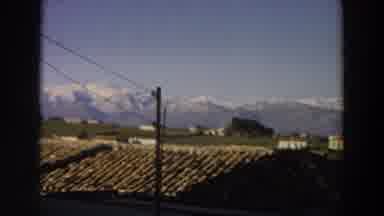 Italy (1958): Beautiful Landscape With A Mountain In The Background And Houses In