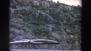 Italy (1958): Video Inside A Vehicle Shows Hills And A Man Standing Near Them