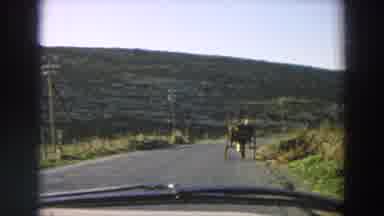 Italy (1958): Driving Down A Road Passing A Cart