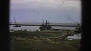 Italy (1958): Old Boat Moored At The Pier Of A Blue River