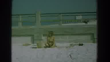 Yorktown Virginia (1958): Lady Looking Around Sitting On A Towel On The Beach With