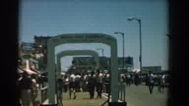 Yorktown Virginia (1958): A Busy Beach And A Busy Sidewalk Adjacent With People