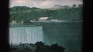 Yorktown Virginia (1958): Man Is Holding His Two Children Outside Overlooking A