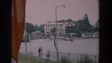 Yorktown Virginia (1958): Motorboat About To Dock In Small Town Flags Fluttering