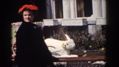 Yorktown Virginia (1958): Woman Wearing Red Hat Stands Next To White Outdoor