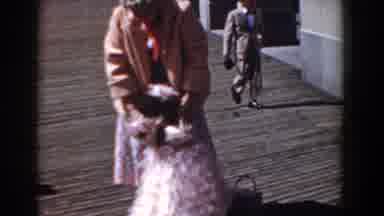 Yorktown Virginia (1958): Lady On Boardwalk Adjusts Dress Worn By Standing And
