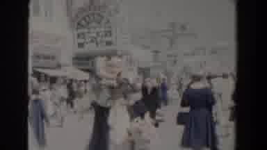 Yorktown Virginia (1958): Woman Carrying A Monkey Wearing White Clothes She Is